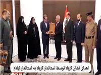 اهداي نشان کربلا توسط استاندار کربلا به استاندار ايلام