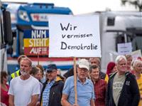 Germany`s migrant helpers face threats and abuse amid far-right rise