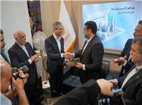 امضاي تفاهم نامه همکاري بين بانک ملي ايران و گروه مالي کاريزما در نمايشگاه اينوکس مشهد