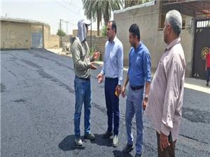 ??  عمليات آسفالت ريزي خيابان ها و معابر روستاي بکيشه بخش ميان آب شوشتر
