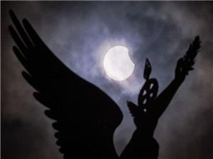 Despite clouds, some see partial eclipse in parts of Europe
